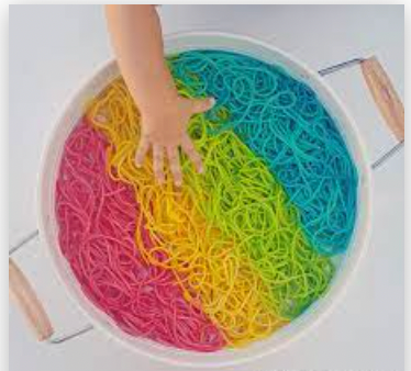 Coloured noodles for sensory play
